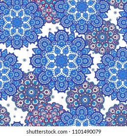 Seamless oriental ornamental pattern. Vector laced decorative background with floral and geometric ornament. Repeating tiles with mandala. Indian or Arabic motive.