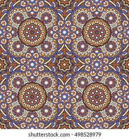 Seamless oriental ornamental pattern. Vector laced decorative background with floral and geometric ornament. Repeating geometric tiles with mandala. Indian or Arabic motive. Boho festival style.