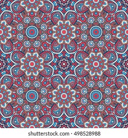 Seamless oriental ornamental pattern. Vector laced decorative background with floral and geometric ornament. Repeating geometric tiles with mandala. Indian or Arabic motive. Boho festival style.