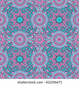 Seamless oriental ornamental vector pattern. Laced decorative background with round floral and geometric ornament. Repeating inwrought mandala tiles. Indian or Arabic motif. Boho festival style.