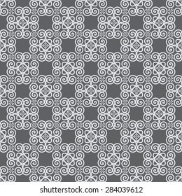 Seamless Oriental  Pattern of  Abstract Floral Tiles, With Spirals And Flowers of Petals of Diamond Shape. White Pattern on Gray Background.
