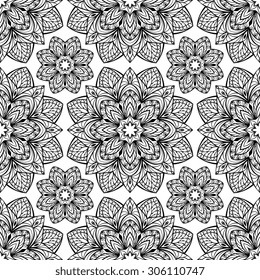 Seamless oriental pattern of black mandalas on a white background. Vector ornament of stylized floral elements. Template for wrapping paper
