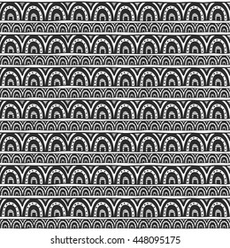 Seamless ornament from circle geometric elements big and small in ethnic style