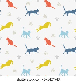 Seamless ornament consists of repeating the contours of the cats. The animals depicted on the background of the tracks. Vector illustration.