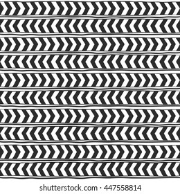 Seamless ornament from geometric elements chevron aimed to different sides in ethnic style