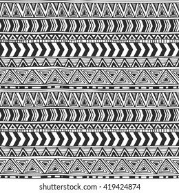 Seamless ornament from geometric elements triangle and chevron in ethnic style black and white