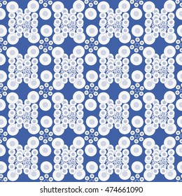 Seamless ornament made from circles of different sizes. Vector illustration.