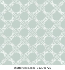 Seamless ornament on green background. Wallpaper pattern