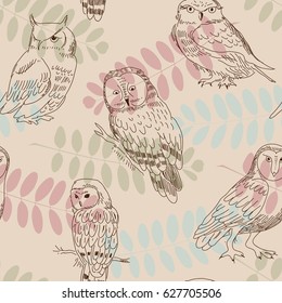 Seamless ornament with wild owls on  background of tree branches