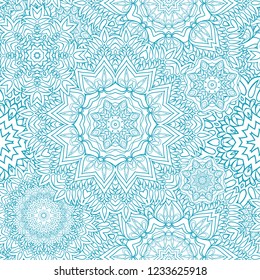 Seamless ornamental blue - white winter background