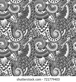 Seamless ornamental  ethnic doodle pattern. Floral background with flowers, berries, waves, leaves, curly lines. Good for wallpaper, pattern fills, textile, fabric, wrapping, surface textures.