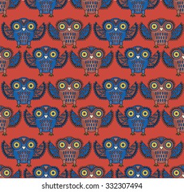 Seamless ornamental etnic owls pattern. owl textile wallpaper