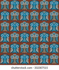 Seamless ornamental etnic owls pattern. owl textile wallpaper