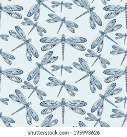 Seamless ornamental hand drawn vintage vector pattern with dragonflies.