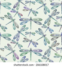 Seamless ornamental hand drawn vintage vector pattern with dragonflies.