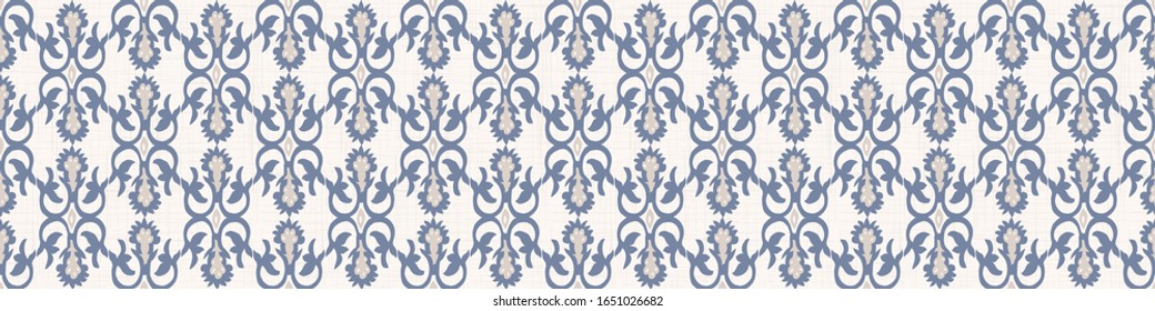 Seamless ornate medallion border pattern in french cream linen shabby chic style. Hand drawn floral damask bordure. Old white blue background.  Interior home decor edging. Ornate flourish ribbon trim
