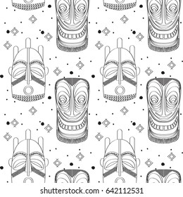 Seamless outline pattern with tribal masks in black and white colors. Hand drawn design for fashion, textile, fabric, wrapping paper, tiles, website wallpaper, background.