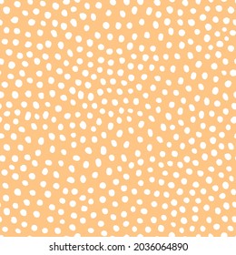 Seamless paattern with abstract dots. Hand drawn yellow backgrond. Vector texture for print, textile, packaging. Polka dot pattern