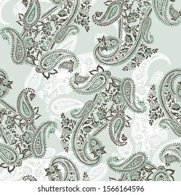 seamless paisley pattern on green background