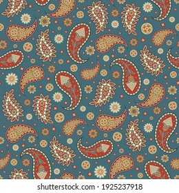 Seamless paisley pattern on green background