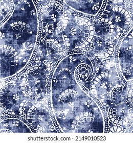 Seamless paisley pattern with stamped distressed effect. abstract ethnic paisley pattern in Indian style on indigo, denim background.