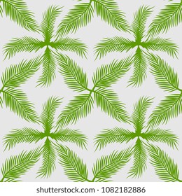 Seamless palm leaves. Coconut leaf pattern for summer holiday fashion textile or background. Green tropical ready for print.