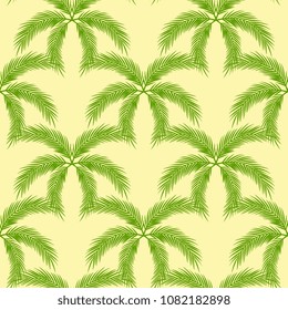 Seamless palm leaves. Coconut leaf pattern for summer holiday fashion textile or background. Green tropical ready for print.
