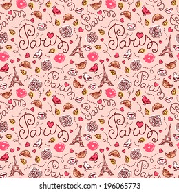 Seamless Paris pattern with croissant and Eiffel tower on pink background. Hand drawn vector illustration