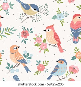 Seamless pastel pattern of birds with floral elements on dot  background.