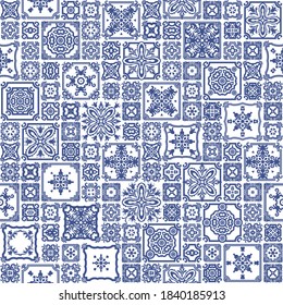 Seamless patchwork pattern of blue painted mosaic tiles with geometrical and floral ornaments in Dutch majolica ceramic style. Wallpaper décor, batik print, surface map, wrapping paper