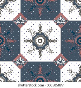 Seamless patchwork pattern from dark blue and light grey oriental ornaments, Indian style decorative rosette from stylized flowers and leaves. 
