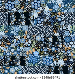 Seamless patchwork pattern from different fabrics with blue flowers.