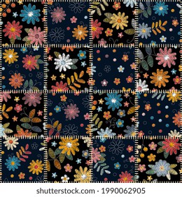 Seamless patchwork pattern from stitched square snippets with floral ornaments. Textile print.