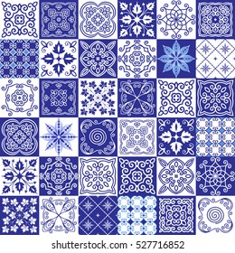 Seamless patchwork pattern from tiles in the oriental style in blue tones.  Background design.
