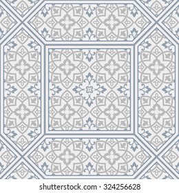 seamless patchwork tile with Victorian motives in blue and grey