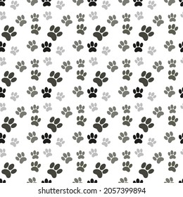 seamless patern footprints. white background. cute black and gray animal tracks. vector texture. print for textiles and wallpaper.