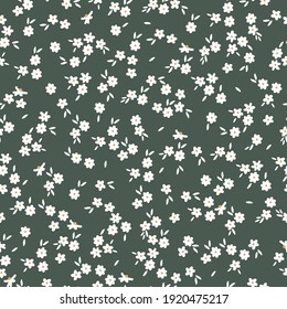 seamless patern vintage. dark green background. small white flowers . vector texture. trendy print for textiles and wallpaper.