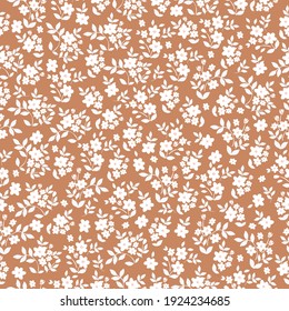 seamless patern vintage. teracotta background. white flower plant ornament. trend print for textiles and wallpaper.