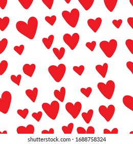 Seamless patter pattern of red hearts on a white background. Design for fabric, wallpaper, wrapping paper.
