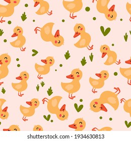 Seamless patter of Yellow little ducklings. Cartoon character drawn in doodle style. Design for baby clothes, posters, postcards