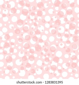 Seamless pattern. Abstract background. White and pink round spots on a rose background. 