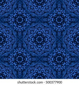 Seamless pattern with abstract blue element on dark background