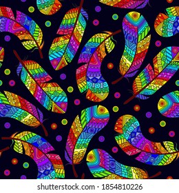 Seamless pattern with abstract bright rainbow feathers on a dark  background