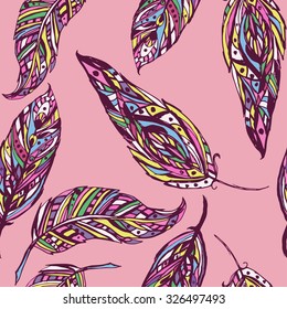 Seamless pattern with abstract colorful feathers