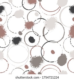 Seamless pattern with abstract colorful shapes on a white background. Circles, stripes, and spots. It can be used for decoration of textile, paper and other surfaces.