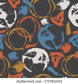 Seamless pattern with abstract colorful shapes in grunge style on a dark background. Circles, spots, splashes. It can be used for decoration of textile, paper and other surfaces.