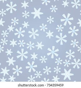 Seamless pattern with abstract colorful snowflakes on grey background. Chaotic, random, scattered winter motives. Vector illustration.