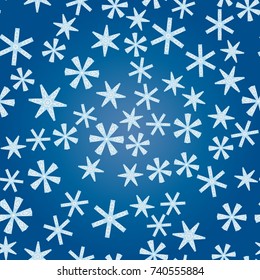 Seamless pattern with abstract colorful snowflakes on blue background. Chaotic, random, scattered winter motives. Vector illustration.
