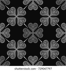 Seamless pattern with abstract delicate four-leaf clover. Black and white vector illustration