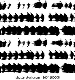 Seamless pattern from abstract different long textured black brush strokes on a white background